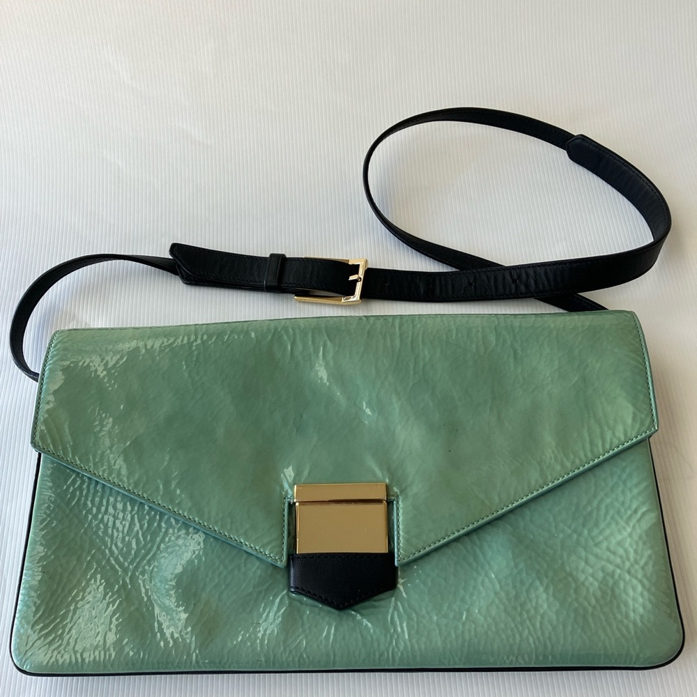 Time’s Arrow Seaglass & Navy Color-Block Patent Vega Bag with Adjustable Strap.
